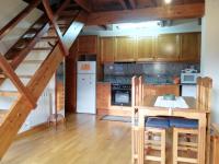 A kitchen or kitchenette at Apartament Ca de Gallisca