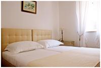 Postel nebo postele na pokoji v ubytování Casa Zorana-Alba Apartments