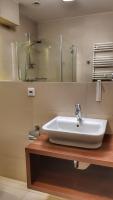 Kúpeľňa v ubytovaní Holiday Home Aparthotel z balkonem przy plaży