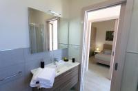 A bed or beds in a room at Le Dimore di Otranto