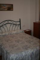 Postel nebo postele na pokoji v ubytování Apartamentos Sierra del Hacho