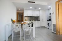 A kitchen or kitchenette at BBarcelona Gaudí Flats