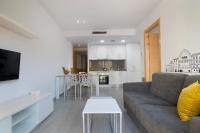A kitchen or kitchenette at BBarcelona Gaudí Flats