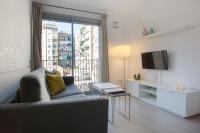 A television and/or entertainment centre at BBarcelona Gaudí Flats