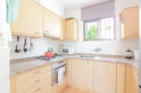 A kitchen or kitchenette at Villa Santa Lucia - 0204