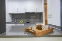 A kitchen or kitchenette at BBarcelona Gaudí Flats