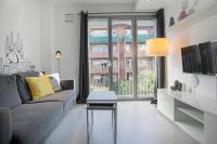 A seating area at BBarcelona Gaudí Flats