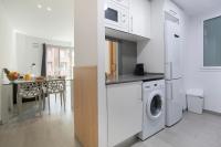 A kitchen or kitchenette at BBarcelona Gaudí Flats