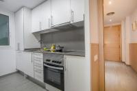 A kitchen or kitchenette at BBarcelona Gaudí Flats