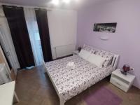 Posteľ alebo postele v izbe v ubytovaní Guest House Mačić