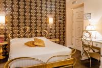 Posteľ alebo postele v izbe v ubytovaní Locanda Del Sole-Roma Piazza Di Spagna Ripetta