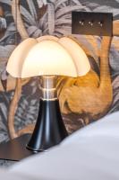 Le Dortoir Boutique Suitesにあるベッド