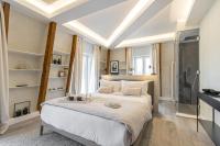 Le Dortoir Boutique Suitesにあるベッド