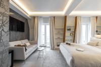 Le Dortoir Boutique Suitesにあるベッド