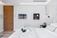 Le Dortoir Boutique Suitesにあるベッド