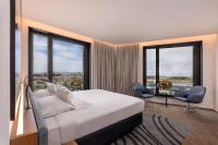 Novotel Christchurch Airportにあるベッド