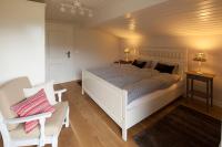 Łóżko lub łóżka w pokoju w obiekcie Finest Ski Chalet Leogang by All in One Apartments