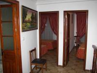 a room with a door and a room with a bedroom at Casa Rural La Verdura in Ubrique