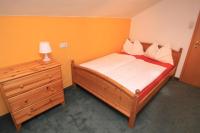 Łóżko lub łóżka w pokoju w obiekcie Pension Reiterhaus