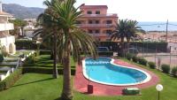 Bazén v ubytovaní Residencial Playa Romana alebo v jeho blízkosti