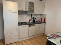 Kuchyň nebo kuchyňský kout v ubytování Apartmani Spomenka