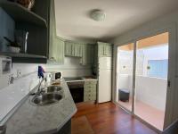 Kuchyň nebo kuchyňský kout v ubytování Apartamento con vistas