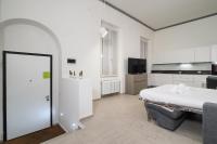 A bed or beds in a room at PrimoPiano - Gluck