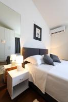 Posteľ alebo postele v izbe v ubytovaní Bellevue Hill apartment