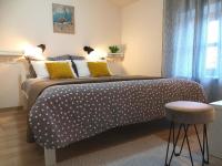 Postel nebo postele na pokoji v ubytování Apartment Franko - Hum