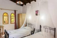 Posteľ alebo postele v izbe v ubytovaní Stavros Villas&Apartments