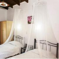 Posteľ alebo postele v izbe v ubytovaní Stavros Villas&Apartments