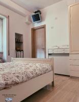 Posteľ alebo postele v izbe v ubytovaní Ale&Andrea Apartments BLU & LILLA