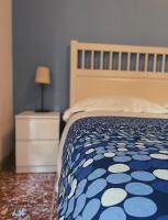 Posteľ alebo postele v izbe v ubytovaní Ale&Andrea Apartments BLU & LILLA