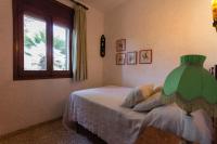 Posteľ alebo postele v izbe v ubytovaní INNOUTHOME Gran villa con piscina torrent del pi