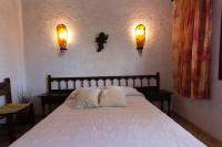 Posteľ alebo postele v izbe v ubytovaní INNOUTHOME Gran villa con piscina torrent del pi