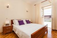 Poste&#x13E; alebo postele v izbe v ubytovan&iacute; Apartment Dado - terrace with sea view