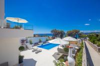 Bazén v ubytovaní Luxury villa Punat with pool with sea view , 50m from the beach alebo v jeho blízkosti