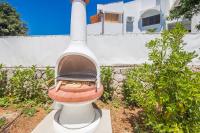 Vonkajšia záhrada v ubytovaní Luxury villa Punat with pool with sea view , 50m from the beach
