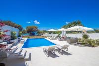 Bazén v ubytovaní Luxury villa Punat with pool with sea view , 50m from the beach alebo v jeho blízkosti