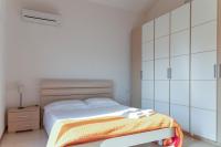A bed or beds in a room at Case Fiorite