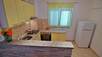 Kuchyň nebo kuchyňský kout v ubytování Apartments Iko