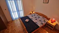 Postel nebo postele na pokoji v ubytování Apartments Iko