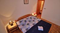 Postel nebo postele na pokoji v ubytování Apartments Iko
