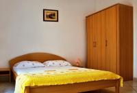 Postel nebo postele na pokoji v ubytování Apartments Iko
