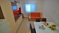Kuchyň nebo kuchyňský kout v ubytování Apartments Iko