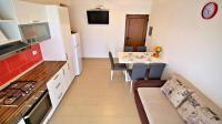Kuchyň nebo kuchyňský kout v ubytování Apartments Iko