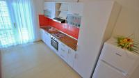 Kuchyň nebo kuchyňský kout v ubytování Apartments Iko