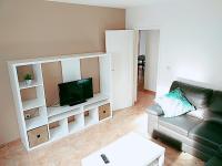 Televízia a/alebo spoločenská miestnosť v ubytovaní la casa de las palmeras