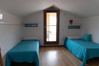 A bed or beds in a room at Case Fiorite