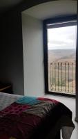 Postel nebo postele na pokoji v ubytování Castell de Fonolleres